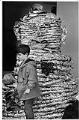 Image of Philip Ripley with aluminum foil statue at Renton Park Elementary School, Renton, April 14, 1992