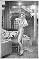 Image of Model posing in Egyptian-inspired dress at Pike Place Market, Seattle, November 30, 1978