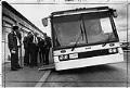 Image of Metro drivers inspecting prototype kneeling bus, Seattle, March, 1975