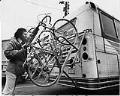 Image of Tom Friedman demonstrating experimental bike rack, Seattle, April 27, 1978