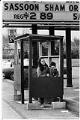 Image of Metro passengers waiting at temporary bus shelter, Seattle, March 6, 1982