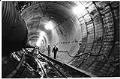 Image of Two men walking in bus tunnel, Seattle, January 19, 1988