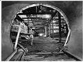 Image of Metro Transit inspector standing in bus tunnel under construction, Seattle, May 18, 1988