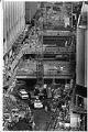 Image of Crane placing beams for Metro tunnel station, Seattle, March 9, 1988
