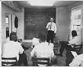 Image of Rev. Dr. John H. Adams with Freedom Patrol members at CORE headquarters, Seattle, July 24, 1965