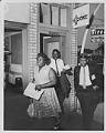 Image of Freedom Patrol members leaving CORE headquarters, Seattle, July 24, 1965