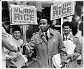 Image of Norm Rice handing out campaign literature near Westlake Mall, Seattle, September 17, 1985