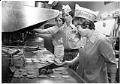 Image of Employees working hamburger grill at Herfy's, Seattle, January 14, 1977