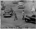 Image of Pedestrians crossing intersection at 7th Ave and Battery St., Seattle, May 25, 1951