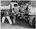 Image of Men preparing a transit system sand truck, Seattle, December 29, 1951