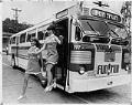 Image of Elaine Youch and Elizabeth Holsten leaving Fun! Run Bus, Seattle, June 20, 1972