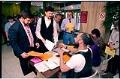 Image of Gay couple registering a domestic partnership at the Municipal Building, Seattle, September 6, 1994