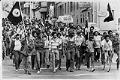 Image of UCWA members marching down Madison St., Seattle, July 7, 1972