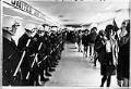 Image of King County Sheriff officers watching CCA demonstrators at Sea-Tac airport, November 6, 1969
