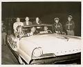 Image of Adlai Stevenson, Don Magnuson, Al Rossellini, Henry Jackson, and Max Antin seated in a Lincoln during a parade, Seattle, circa 1955