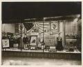 Image of Pacific Outfitting Company storefront display welcoming Loyal Order of Moose, Seattle, circa 1920