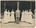 Image of Pacific Outfitting Company employees outside storefront, Seattle, circa 1915