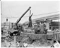 Image of Removal of Chief Si'ahl (Chief Seattle) statue for cleaning before the Century 21 Exposition, Seattle, 1962