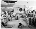 Image of NCR employees and exhibit at the Century 21 Exposition site, Seattle, 1962