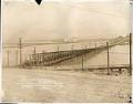 Image of Wooden bridge near Alki Avenue regrade area, West Seattle, September 24, 1913