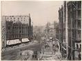 Image of View of Pioneer Square showing construction of Pioneer Building, circa 1890