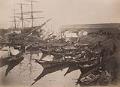 Image of Native American camp with canoes, Ballast Island, Washington Street, Seattle, circa 1890