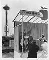 Image of Donna Rydberg in costume on makeshift stage with Gracie Hansen, 1961