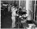 Image of Employees at work during KING-TV filming at the Currin-Greene Shoe Manufacturing Company, Seattle, 1959
