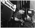 Image of Tony Russo at work during KING-TV filming  at the Currin-Greene Shoe Manufacturing Company, Seattle, 1959
