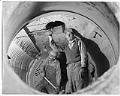 Image of A. Koch and John Grim at Pacific Coast Cement Company, Seattle, December 12, 1952