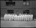Image of Members of Glaziers Local Union No. 188 posing with banner, Seattle, circa 1900