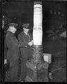 Image of Two policemen posting Civilian Exclusion Order No. 17, Seattle, June 16, 1942