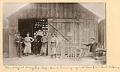 Image of August Wenzel in front of his blacksmith shop at 7th and Pike, Seattle, 1889