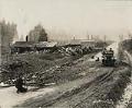 Image of Car driving on Seattle to Bothell road, February 9, 1915