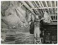 Image of Man with display at the Frozen Fish Museum, Seattle, 1950
