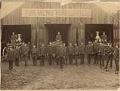 Image of Firemen posing outside Seattle Fire Department, November 1889