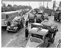 Image of U. S. soldiers and Japanese Americans preparing for forced removal, Bainbridge Island, March 30, 1942