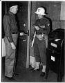 Image of HDIR member checking documentation, Seattle, circa 1941