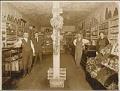 Image of Thomas and Warren French posing inside their grocery store, Seattle, circa 1910