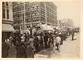 Image of Spectators watching a circus parade on Second Avenue, Seattle, circa 1900