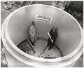 Image of Men in Metro Sewer project pipe, Seattle, February 1962