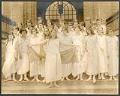 Image of Eighth grade girls in Greek costume on steps of Madrona School, Seattle, 1923