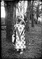 Image of William Shelton posing in traditional garments, circa 1925