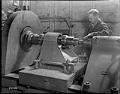 Image of Berger Engineering Works employee with machinery, Seattle, circa 1944