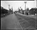 Image of Passengers boarding trolley at West Seattle Junction,  circa 1925