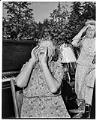 Image of Woman in husband-calling contest, Seattle, August 20, 1950