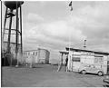 Image of Customs officials standing outside Foreign Trade Zone, Seattle, May 1950