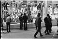 Image of Game operator talking with visitors at Fun Forest, Seattle Center, March 1971