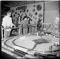 Image of Children watching model train display at Seattle Center, June 1, 1963