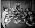 Image of Women and children sitting at table at Seattle Children's Home, December 24, 1942